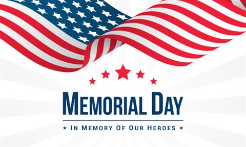 memorial day in memory of our heroes with an American flag in the background