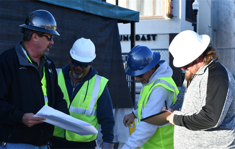 Public Works Crew Working with Hard Hats on